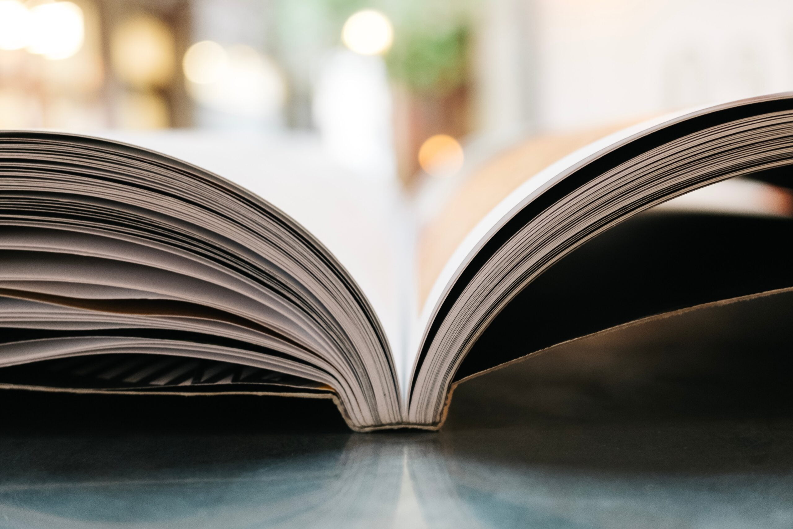 An image showcasing the tools and capabilities of Publisher Rocket and Book Bolt side by side, highlighting their features such as keyword research, competitor analysis, sales tracking, and book category suggestions